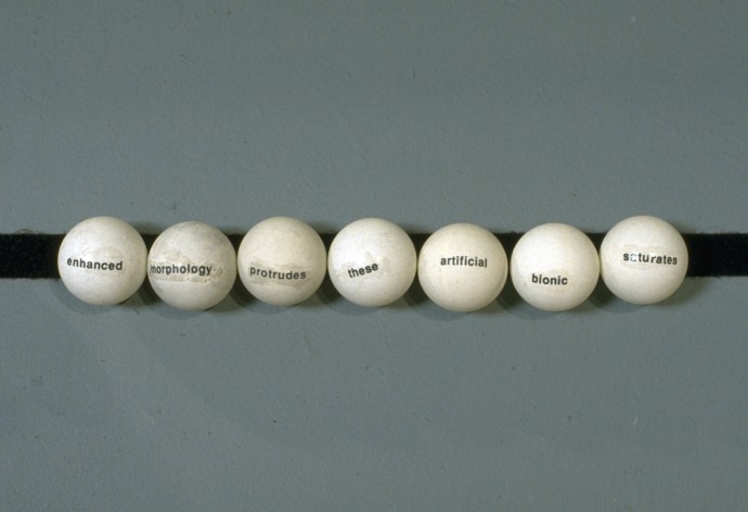 Limited Domain Meaning Machine by Ken Rinaldo and Amy Youngs Premiere at ACME Gallery San Francisco 1995. Washing machine tub, motor, light, electronics, velcro and ping-pong balls with dry transfer lettering.