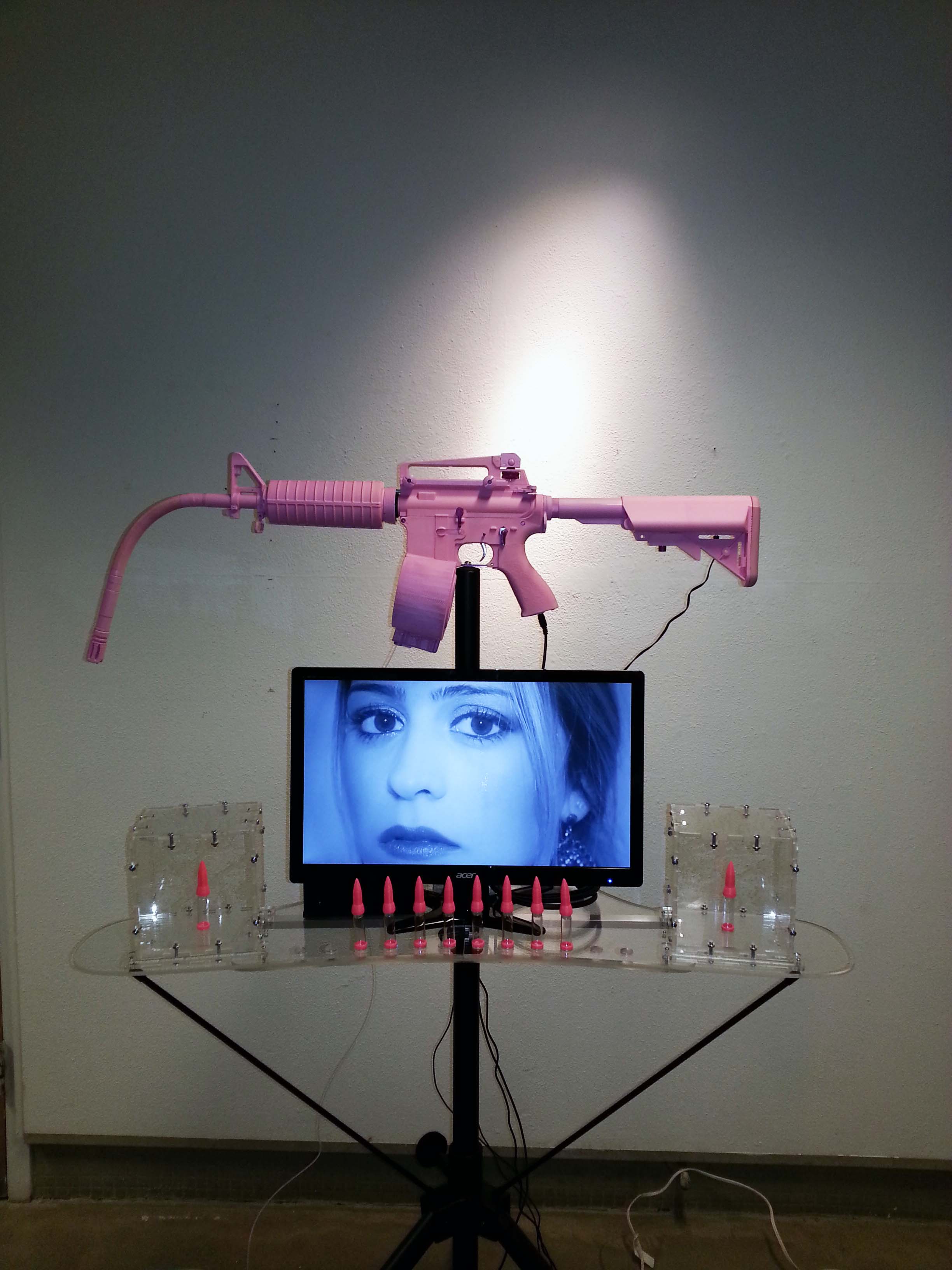 The Woman's Tears Machine Gun bullet holding Woman's tears pink gun